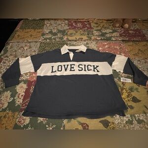 Torrid lovesick rugby style polo shirt. Size 1. NWT